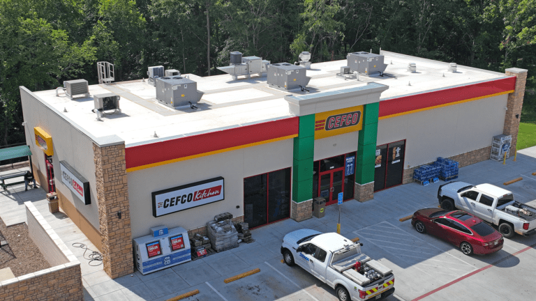 Aerial photography gas station 2400 front of building