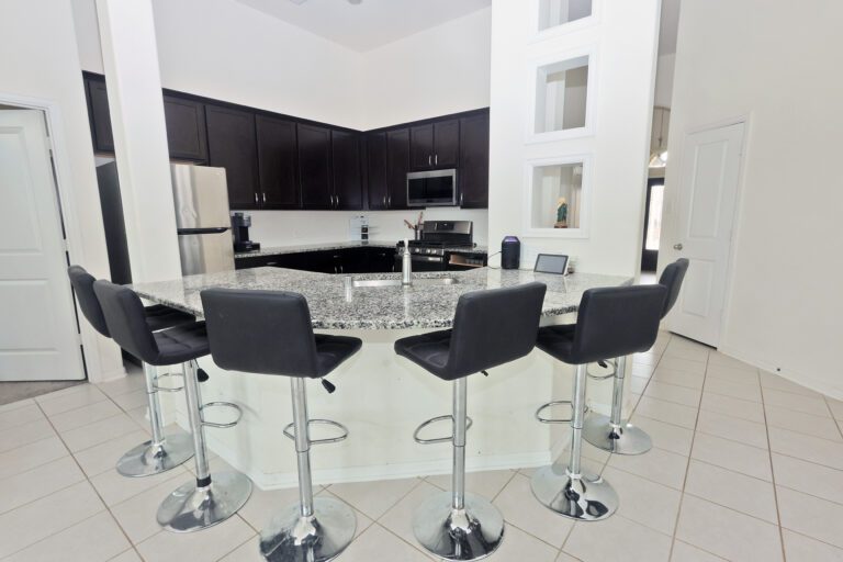 real estate photography of bar area in kitchen