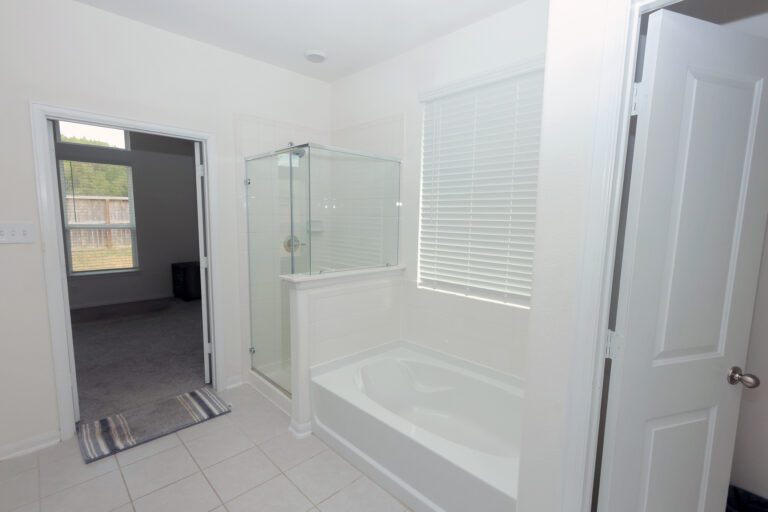 real estate photography of master bathroom